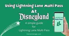 a hand holding a phone with the text using lightning lane multi pass at disneyland