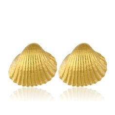 Discover the allure of our gold-plated seashell earrings, exquisitely crafted to capture the essence of the ocean's natural beauty. They feature delicate details and a lustrous finish, offering a timeless elegance that complements any outfit. Perfect for both casual and formal occasions, these earrings are a statement of sophisticated style and coastal charm. Handcrafted with 24k Gold plated brass Nickel, lead and cadmium free Earring pins are made of gold plated 925 silver which are non-allerge Earring Pins, Seashell Earrings, Coastal Charm, August Birthstone Jewelry, July Birthstone Jewelry, Free Earrings, Jewelry Ring Box, Gifts For New Mums, Pearl Jewellery Earrings