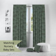 a room with green curtains and pictures on the wall