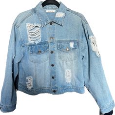 All Orders Ship Next Business Day! Distressed Denim Jacket Conditions: Clean/Good Condition Medium-Wash Denim Size M Shoulder To Shoulder: 18” Waist: 18” Length: 20” Measurements Are Approximate Button Closures Hand Washed - Never Used Drying Machine 100% Cotton Distressed, Faded Denim, Holes, Rips, Perfect For Concerts And Breweries! Smoke Free Home! Light Wash Ripped Cotton Denim Jacket, Light Wash Ripped Button-up Denim Jacket, Ripped Light Wash Button-up Denim Jacket, Ripped Denim Blue Button-up Denim Jacket, Ripped Denim Blue Button-up Jacket, Ripped Light Wash Denim Outerwear, Casual Washed Blue Ripped Denim Jacket, Casual Ripped Washed Blue Denim Jacket, Ripped Light Wash Denim Jacket