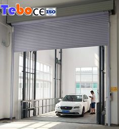 a man standing next to a white car in front of an open garage door with the words teco cesso on it