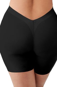 Designed to smooth the thighs, these shaping shorts are cinched at the waist with more room in the hips and bottom to fit and flatter an hourglass figure. Hidden stays keep it from rolling or losing its shape, and the V-back and raw edges keep it smooth and discreet under low-back outfits. 5 1/2" inseam Moderate control Cotton-lined gusset 54% polyamide, 46% spandex Hand wash, dry flat Imported Compressive Bottoms With Built-in Bra Mid-thigh Length, Shapewear Bottoms With Built-in Shorts, Solid Shapewear With Built-in Shorts, Short Length Shapewear Bottoms With Wide Waistband, Fitted Shorts With Built-in Bra, Mid-thigh Length, Short Bottoms With Compression And Wide Waistband, Shapewear With Built-in Bra In Short Shape, Fitted Bottoms With Built-in Bra, Mid-thigh Length, Shapewear Bottoms With Built-in Bra