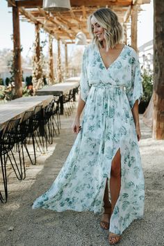 Kia Kimono Maxi Dress, Elegant Green V-neck Floral Dress, Chic Green V-neck Floral Dress, Summer Short Sleeve Sage Dress, Sage Short Sleeve Summer Dress, Short Sleeve Sage Summer Dresses, Sage Dresses For Summer Beach, Green Summer Dress With Surplice Neckline, Green Flowy Dress With Surplice Neckline