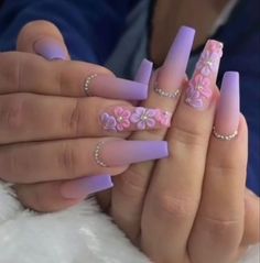 Pink Nails With Purple Flowers, Ombre And Flower Nails, Purple Ombre Nails With Rhinestones, Purple 3d Flower Acrylic Nails, Repunzel Quince Theme Nails, Acrylic Nails Purple Lavender Butterfly, Purple Nail Designs With Flowers, Pink And Purple Flower Nails, Purple And Pink Quinceanera Ideas