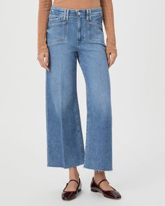 This ultra high-waisted wide leg has an easy, relaxed fit and an ankle length silhouette. This pair is crafted from our PAIGE VINTAGE denim in the perfect light wash with lived-in distressing, natural fading, set in front pockets, double belt loops and a raw hem. PAIGE Vintage takes all of the work out of breaking in your favorite pair of vintage jeans. We've combined the comfort of stretch with everything you love about authentic vintage denim to create super soft jeans that feel perfectly lived-in from the very first wear. Everyday Cropped Flare Jeans For Spring, Everyday Spring Cropped Flare Jeans, Cropped Flare Jeans For Spring, Relaxed Fit Washed Blue Cropped Flare Jeans, Fall Light Wash Wide Leg Cropped Jeans, Fall Washed Wide Leg Cropped Jeans, Light Wash Wide Leg Cropped Jeans For Fall, Wide Leg Washed Cropped Jeans For Spring, Light Wash Cropped Jeans For Fall