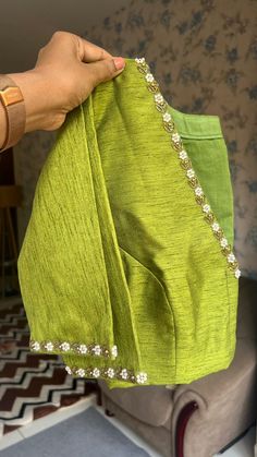 Product Descriptions : Green soft organza saree with heavy embroidery border works comes with green silk V neck highlighted pearl hand worked blouse View this post on Instagram A post shared by Handcrafted Sarees by Shobana Nithin (@threadslabel_india) Green Heavy Blouse, Blouse Simple Hand Work Designs, Pattu Saree Simple Blouse Designs, Elegant Aari Work Blouse Design, Blouse Works Latest, Heavy Embroidered Blouse Designs, Silk Saree Blouse Embroidery Designs, Green Pattu Sarees Weddings, Simple Blouse Designs For Saree Pattu