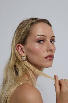 Meet our best-selling Gigi earrings. The Gigi earrings give you a vintage feel like no other, evoking the sentiment of treasures from your grandmother's closet Infuse a touch of timeless elegance into your modern ensembles by adorning these vintage-inspired earrings. Gold Plated with Faux Pearl Detail. Classic Bridal Earrings For Evening, Classic Clip-on Drop Earrings, Classic Single Earring For Evening, Elegant Clip-on Earrings For Evening, Classic Clip-on Bridal Earrings For Evening, Classic Drop Earrings For Evening, Classic Evening Bridal Clip-on Earrings, Classic Evening Drop Earrings, Elegant Clip-on Plug Earrings