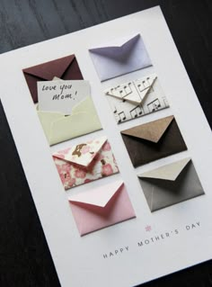 a card with different types of envelopes on it and the words happy mother's day