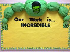 a bulletin board with the words our work is incredible and an image of a green monster