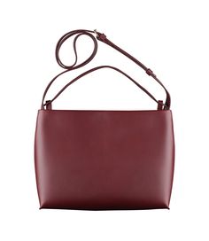 A.P.C. Women's bag. - Minimalist elegant bag.- Smooth vegetable-tanned leather.- Magnetic closure.- Removable strap to wear the bag on the shoulder or across the chest.- Handle embossed A.P.C. to carry the bag by hand.- One interior zip pocket.- Embossed goldtone 'A.P.C. Rue Madame Paris' logo. Bag Minimalist, Paris Logo, Faux Leather Bag, Elegant Bags, Exclusive Clothing, Backpack Tote Bag, Scarf Jewelry, Pouch Bag, Small Leather Goods