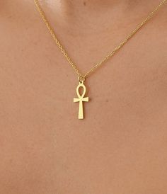 Discover the timeless elegance of the 14K Gold Ankh Necklace, a perfect gift for any occasion. This exquisite Ankh Pendant is a symbol of life, blending ancient Egyptian heritage with modern style. Whether it's for a birthday, anniversary, or just because, this piece makes an ideal gift for him. ✨ Key Features: Suitable for All Celebrations: This 14K Gold Ankh Necklace is versatile and perfect for any celebration, making it a thoughtful and meaningful gift for your loved ones. Handmade: Each nec Elegant Ceremonial Cross Necklace, Gold Ankh Necklace For Ceremonial Occasions, Traditional Cross Pendant Necklace As Gift, Traditional Cross Pendant Necklace For Gift, Ceremonial Cross Necklace In Spiritual Style, Traditional Cross Pendant Jewelry As Gift, Traditional Cross Pendant Jewelry For Gift, Traditional Cross Pendant Jewelry Gift, Handmade Ankh Gold Necklace