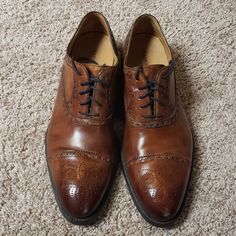 Magnanni, Rubber Sole Business Wingtip Dress Shoes With Ortholite Insole, Classic Formal Lace-up Shoes With Ortholite Insole, Brown Formal Oxfords With Ortholite Insole, Business Casual Almond Toe Oxfords With Removable Insole, Business Casual Oxfords With Removable Insole And Almond Toe, Wingtip Dress Shoes With Ortholite Insole For Business, Business Dress Shoes With Ortholite Insole And Wingtip, Semi-formal Dress Shoes With Almond Toe And Removable Insole, Semi-formal Dress Shoes With Removable Insole And Almond Toe