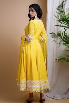 Yellow anarkali with all over digitally printed bandhani and placement white lace detailing. Paired with a straight palazzo and dupatta with lace detailed border. - Aza Fashions Transitional Designer Anarkali Set With Bandhani Print, Designer Bandhani Print Anarkali Set For Eid, Bandhani Print Maxi Length Sets For Navratri, Eid Designer Anarkali Set With Bandhani Print, Navratri Bandhani Print Maxi Length Sets, Navratri Bandhani Print Maxi Sets, Eid Bandhani Print Traditional Drape Dress, Bollywood Style Bandhani Print Maxi Sets, Festival Bandhani Print Salwar Kameez In Maxi Length