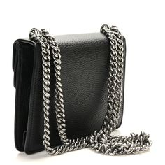 This is an authentic GUCCI Calfskin Mini Dionysus Shoulder Bag in Black. This chic bag is crafted of grained black calfskin leather. The bag features an aged silver chain strap and a textured silver horseshoe closure encrusted with smokey grey stones and tiger heads at each end. The front flap opens to a beige fabric interior. Gucci Bag Dionysus, Gucci Crossbody Bag, Gucci Crossbody, Gucci Shoulder Bag, Tiger Head, Chic Bags, Crossbody Wallet, Beige Fabric, Shoulder Bag Black