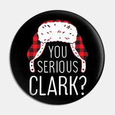 a button with the words you serious clark? in white and red plaid on it