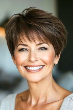 Save this pin for the best hairstyles for women over 60 with bangs. This textured pixie is perfect for women who want a low-maintenance style with plenty of personality. The choppy layers create volume, while the bangs add a soft touch. Haircuts For Over 60 Layered Bobs, Short Hair Older Women Over 50 Simple, Short Wavy Haircuts With Bangs, Short Hair Styles For Women Over 60 Chic, Feminine Short Hair Round Face, Chopped Bob Haircut, Bangs Over 60, Hairstyles For Over 70 Year Old Women, Hair Styles For Women Over 70