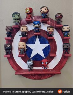 the captain's shield is made out of wood and has many figurines on it