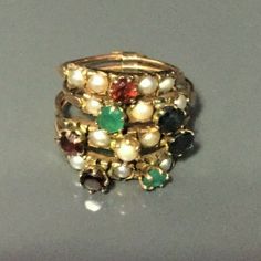 Stunning Original Victorian Multi Band Rose Gold Ring Emerald, Ruby Sapphire And Pearl Stones Size 6- See Picture Elegant Multicolor Rings With Rose Cut Diamonds, Heirloom Multi-stone Rose Gold Jewelry, Heirloom Rose Gold Multi-stone Jewelry, Elegant Multicolor Jewelry With Rose Cut Diamonds, Elegant Multicolor Rose Cut Diamond Jewelry, Antique Multi-stone Cluster Jewelry, Elegant Multicolor Stackable Birthstone Rings, Elegant Multi-stone Cluster Birthstone Ring, Elegant Multicolor Stackable Rings For Wedding