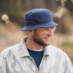 An ideal proposition for fishing and travel enthusiast - practical and comfortable Bucket style, Golf short brim hat made of weatherproof waxed cotton. Waxed cotton is made by the greatest British Millerain, so it is not only very breathable, but also has exceptional weather-resistant properties. Because of the special blend of waxes, it has a drier feel than common waxed fabrics and is waterproof. The British Millerain company was established in 1880, since then it became a pioneer of waxed cotton.  Its 5cm wide stitched brim protects well from the sun, doesn't heat up and makes it a perfect outdoor activity hat. Crown height: ca.9.5 cm/3.74 inch. It's a very lightweight Bucket hat with a sweatband made of cotton to make it more comfy. CZX-GLF-C51 Solid Curved Brim Bucket Hat For Hiking, Solid Color Curved Brim Bucket Hat For Hiking, Waterproof Outdoor Bucket Hat, Casual Windproof Sun Hat For Hiking, Casual Windproof Bucket Hat For Outdoor, Casual Windproof Bucket Hat For Hiking, Waterproof Solid Bucket Hat For Outdoor Activities, Waterproof Solid Color Bucket Hat For Outdoor, Casual Windproof Hiking Bucket Hat