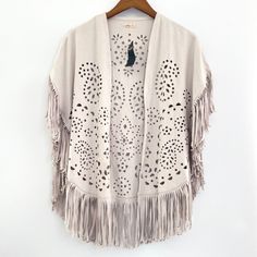 Hollister Grey Beige Boho Western Fringe Faux Suede Cardigan Poncho Sz Xs Beige, Cream, Tan, Greige New With Tags **There Are 2 Very Faint Marks That May Wash Out. One In Front One In Back. See Last 2 Pictures For Details Please Refer To All Pictures Closely For Condition And Approximate Measurements If Any, To Ensure Proper Fit. Measurements May Also Vary Based On Size, Fabric, Wash + Wear. Worn Garment May Also Include Signs Of Aging, Discoloring, Distressing, Markings/Flaws, Due To Wash, Wear, And Aging. Any Major Flaws Will Be Disclosed In Listing. Lighting May Also Affect True Color. All Orders Ship Quickly Within 1-2 Days Of Payment. Your Feedback Is Greatly Appreciated. If N Beige Fringe Cardigan For Spring, Spring Beige Fringe Cardigan, Fall Festival Open Front Tops, Hollister Cardigan, Hollister Crop Tops, Lace Poncho, Suede Cardigan, Knit Poncho Sweater, Black Poncho