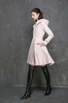 "Keep warm + elegant + stylish in this classic pink wool coat from Xiaolizi. The winter coat made from soft wool material in a fit and flare silhouette. The womens coats topped with a button-down placket + hooded collar. The swing coat finished with ruffle long sleeves + side-entry pockets. ** Detail ** * Wool composition \" 45% wool blend + fiber \" ; An excellent high-quality wool, a beautiful retro wool, The wool itself isn't a thick high end wool but it's very warm and just perfect. Making i Pink Long Sleeve Pea Coat For Winter, Chic Winter Pink Pea Coat, Chic Pink Winter Pea Coat, Pink Winter Pea Coat, Chic Pink Wool Coat, Hooded Sweater Coat For Winter, Fitted Hooded Pea Coat For Winter, Pink Long Pea Coat For Winter, Elegant Hooded Winter Outerwear