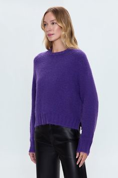 Medium weight sweater crafted from a knit blend that's soft to the touch. Raglan, long sleeves with monochromatic rib trim at neckline, sleeves, and hem. Designed with an elongated crop proportion and split hem that grazes the waistband. Royal Purple Sweater, Fine Knit Stretch Cropped Sweater For Fall, Solid Cropped Knit Top For Fall, Fine Knit Cropped Long Sleeve Sweater For Fall, Winter Cashmere Cropped Sweater For Layering, Fine Knit Cropped Sweater For Fall, Cropped Knit Top For Fall Layering, Textured Stretch Cropped Sweater For Layering, Knit Cropped Sweater With Ribbed Cuffs For Layering