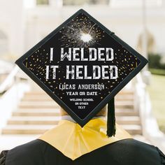 a person wearing a graduation cap that says, i held it heleded lucas anderson year or date