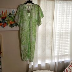 Nwt This Dress Is V-Neck With A Split Located On The Right Side Of The Dress. It Has Green And White Designs All Over With Different Shades Of Green. It Is Size Xs For $18 Price Dropped 10% $16 Now. Great Price For This Maxie Dress. Fitted V-neck Maxi Dress For Daytime, Spring Green Loungewear Dresses, H&m Casual Summer Maxi Dress, Casual H&m Maxi Dress For Summer, Daytime V-neck Maxi Dress, H&m Fitted Summer Maxi Dress, H&m Fitted Maxi Dress For Daywear, H&m Casual Flowy Maxi Dress, Fitted Summer Maxi Dress By H&m