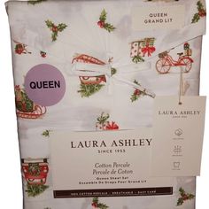 the queen duvet set is white with red and green decorations