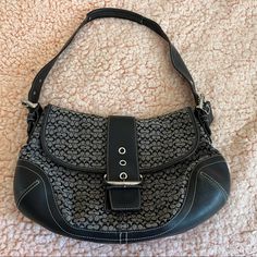 Classic Coach Signature Initial Print Shoulder Bag With Buckle Detail Is In Excellent Condition, Looks Brand New! 12”X14” Not Including The Strap. Coach Black Shoulder Bag For Errands, Coach Black Satchel With Gunmetal Hardware, Casual Coach Shoulder Bag With Silver-tone Hardware, Classic Black Hobo Bag With Gunmetal Hardware, Coach Gray Shoulder Bag With Silver-tone Hardware, Coach Black Satchel With Silver-tone Hardware, Coach Gray Shoulder Bag, Black Hobo Tote Bag With Silver-tone Hardware, Black Rectangular Hobo Bag With Branded Hardware