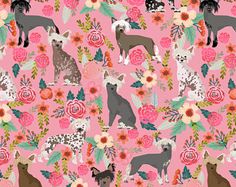 a pink background with dogs and flowers on it