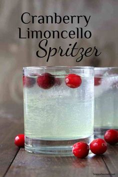 cranberry lemoncello spritzer in two glasses on a wooden table