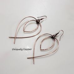 These copper earrings are my new favorite go to, to add a touch of elegance, with a bit of bohemian flare, to any outfit! They are antiqued copper that has been given a hand hammered finish in the center. The dangle earrings measure 3 inches from where the antiqued copper ear wire sits in your ear, and 1 3/4 inches wide. They are sure to become a favorite way to dress up any outfit! Perfect as a copper anniversary wife gift for her, for your 7th anniversary, or 22nd wedding anniversaries. Please 22nd Wedding Anniversary, Copper Anniversary Gifts, Copper Anniversary, 7th Anniversary, Copper Necklace, Wife Gift, Antique Earrings, Copper Pendants, Copper Earrings