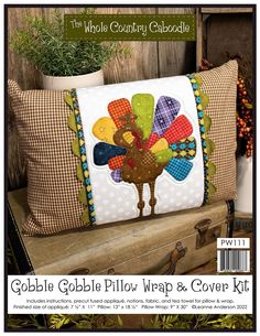 a pillow with a turkey on it and the words gobble plow wrap & cover kit