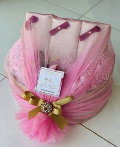 Mother’s cloths wrapped in pink and gold colors for engagement dowry wrapping. Engagement Gift Ideas, Mens Beaded Necklaces, Weddings Idea, Traditional Weddings