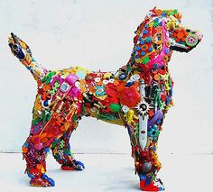 a dog made out of many different types of buttons