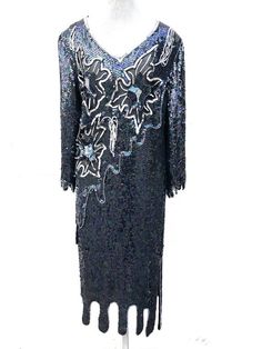 Vintage 1980s does 20s silk sequin flapper party dress. Perfect for a 20s party, or to rock at any formal event! ___________________________________MEASUREMENTSBust: 40"Sleeve: 26"Length: 46"Hip: 38"Modern Size Estimate: MAll measurements are taken with the garment laid flat.__________________________________CONDITION:Excellent Vintage Condition- some sequin lossAll items at Time Warp are vintage, so there is some wear. They may not be 100% free of minor defects, as they have already been loved. Flapper Style Evening Sequin Dress, Flapper Style Sequin Evening Dress, Gatsby Style Sequin Dress For Evening Party, Flapper Sequin Evening Dress For Party Season, Formal Sequined Flapper Dress, Formal Flapper Dress With Sequins, Vintage Flapper Dress For Holiday Evenings, Vintage Sequined Flapper Dress For Formal Occasions, Vintage Sequin Flapper Dress For Formal Events