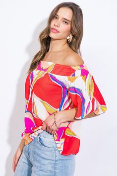 A printed woven top featuring smocked off shoulder neckline and short flutter sleeveDetails:Self: 97% Polyester 3% SpandexSize & Fit- Model is 5`9" And Wearing Size Small- Measurements Taken From Size Small- Approx. Length: 20"