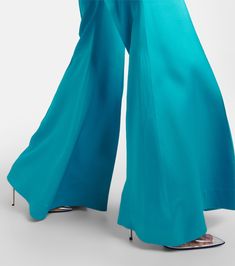 Find NINA RICCI High-rise Satin Flared Pants on Editorialist. Material: 74% acetate, 26% viscose. Care instructions: dry clean. Made in Romania. Designer color name: Bleu. Material II: 100% viscose. Closure: zipper, hook fastening. Chic Evening Bottoms In Viscose, Summer Wide Leg Elastane Pants, Chic Silk Wide-leg Bottoms, Chic Silk Wide-leg Pants, Viscose Evening Trousers, Evening Viscose Trousers, Fitted High-waisted Viscose Pants, Viscose Full-length Workwear Pants, Silk Wide Leg Pants Full Length