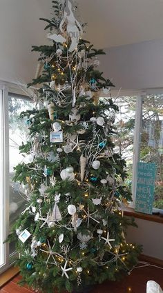 a decorated christmas tree in a living room