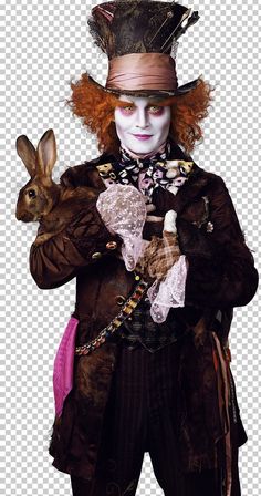 the mad hatter is holding a rabbit in his hand