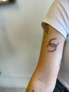 a person with a tattoo on their arm