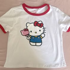 Hello Kitty White Tee Brand New Size - Small White Y2k Cat Print Top, Y2k White Cat Print Top, White Y2k Style Cat Print Top, Fun Cotton Tops With Hello Kitty, Cute White Tops With Cat Design, Cotton Hello Kitty Fun Tops, Hello Kitty Baby Tee, White Hello Kitty Casual Tops, White Hello Kitty Trendy Tops