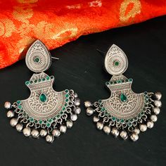 German Silver Oxidized Chandbali/Tribal Oxidized Silver Chandbali Earrings/ Silver Green Blue Pink Earrings / Gift for Girls /Christmas Gift Features: - Length: 2.85 Inches - Earrings come with push back - Contemporary earrings with simulated stones in silver finish. - Very Elegant and stylish, these earrings can be paired with any traditional Indian or Western Attire depending upon the occasion and the theme. - The base is pure brass (90%) and pure 92.5 silver (10%) which makes this very sturdy Handmade Green Bohemian Jhumkas, Handmade Temple Jewelry Danglers For Festival, Green Bohemian Dangle Jhumkas, Festive Green Bohemian Earrings, Traditional Handmade Green Hoop Earrings, Green Oxidized Finish Earrings For Festive Occasions, Bohemian Earrings For Diwali Celebration, Festive Green Oxidized Earrings, Green Bohemian Chandbali Earrings