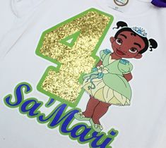 a white shirt with the number four on it and an image of princess pooh