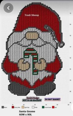 a cross stitch santa clause with the letter f on it