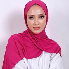 Elevate Your Modest Fashion Game With The Style Me Easy! Stretchy Jersey Hijab Shawl. This Versatile Scarf Can Be Used As A Hijab Or A Shawl For Lounge Wear. The Stretchy Jersey Fabric Is Perfect For Busy Muslimahs On The Go, And The Soft And Breathable 100% Polyester Jersey Material Provides All-Day Comfort. Fabric: Jersey Material: 100% Polyester Color: Hot Pink With Multiple Styling Options Including Turban, Indo-Pak Dupatta, Traditional Hijab, Wear It Pinless With Matching Underscarf Of Style With Using Hijab Magnets Or Pins - This Scarf Is A Must-Have In Your Wardrobe! Plus, It Comes In Various Colors Such As Red, Black, Tan And More To Match Any Outfit. This Scarf Measures From Si Solid Color Hijab For Eid, Modest Pink Hijab For Eid, Pink Niqab For Eid, Modest Pink Headscarf For Eid, Solid Stretch Khimar, Abaya Dress Muslim, Hijab Magnets, Hot Pink Scarf, Pink Hijab