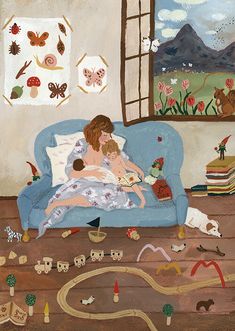 a woman and child are sitting on a couch in front of a window with many toys