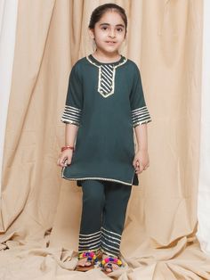 **Specifications : Please visit our brand store** https://www.etsy.com/in-en/shop/AJDezines?ref=seller-platform-mcnav Specially handcrafted clothing for the perfect look and comfort for the festive season 2 Pc Set : 1 Kurti and 1 Pyjama ||Style:- Kurta Salwar Set For Kids Girls Kurti : Solid Plain Kurti made in Rayon. Pajama : Solid Plain Pajama made in Rayon. Introduce your little one to the timeless elegance of traditional wear with this Girls' 3/4 Sleeve Salwar Suit adorned with Gota Patti de Festive Green Pant Set For Eid, Festive Matching Pant Set For Eid, Fitted Green Straight Kurta Pant Set, Festive Green Matching Set, Green Cotton Sets For Festivals, Green Pant Set With Straight Kurta For Navratri, Green Cotton Set For Festivals, Eid Green Cotton Pant Set, Festive Green Cotton Pant Set