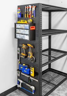 a metal shelving unit with tools on it